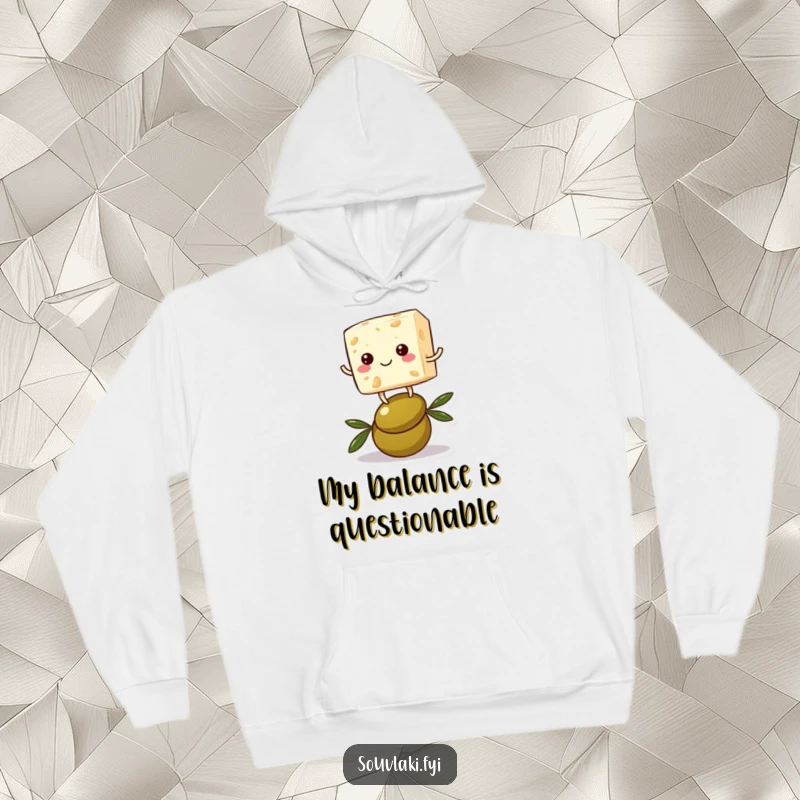 Funny feta cheese hoodie showing a cheerful cube character precariously balancing on an olive, offering warmth and a comical charm.