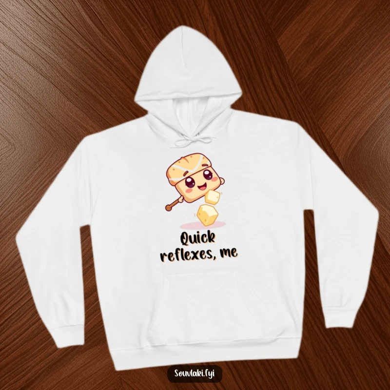 Funny Souvlaki Skewer Feta Escape Hoodie: A giggling souvlaki skewer playfully dodges a falling feta cheese cube.
